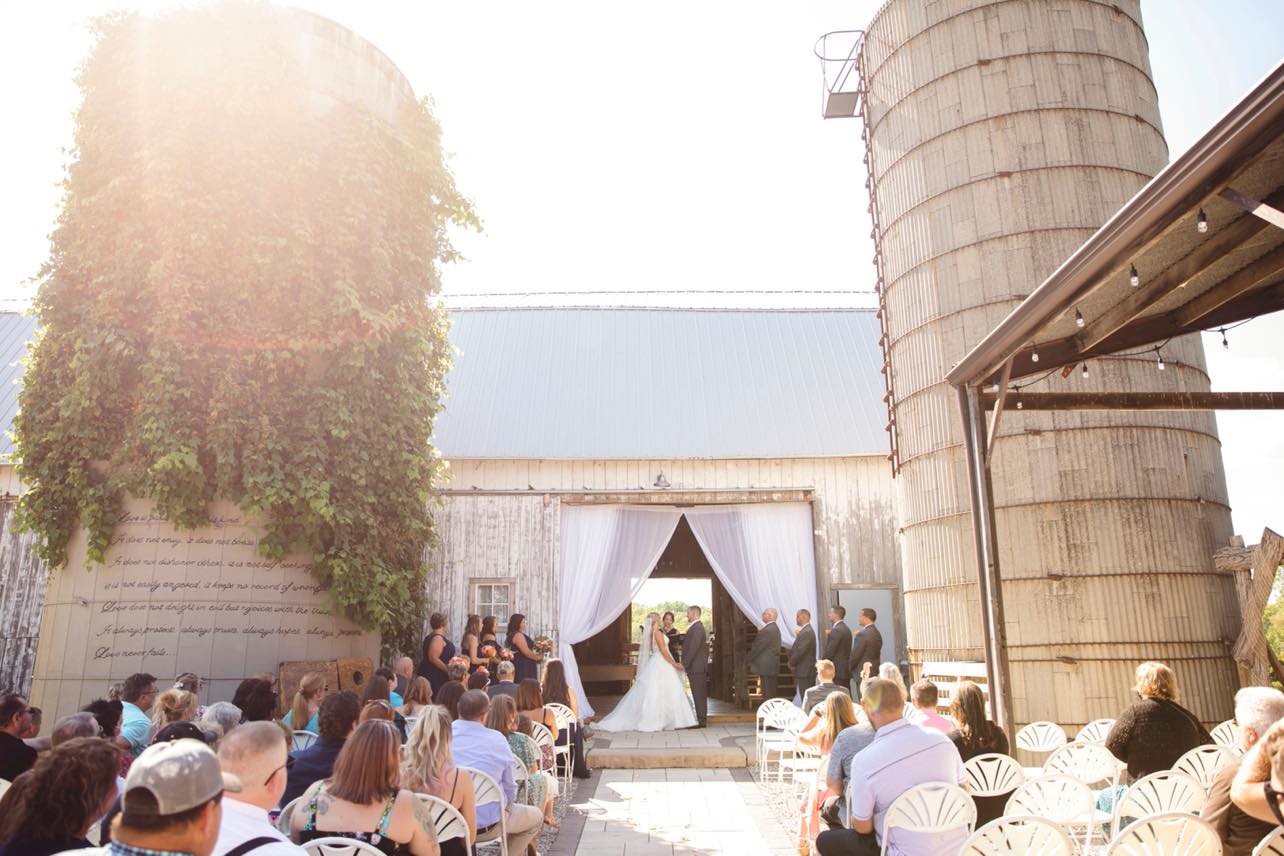 The Silos ceremony location with rustic silos in the background